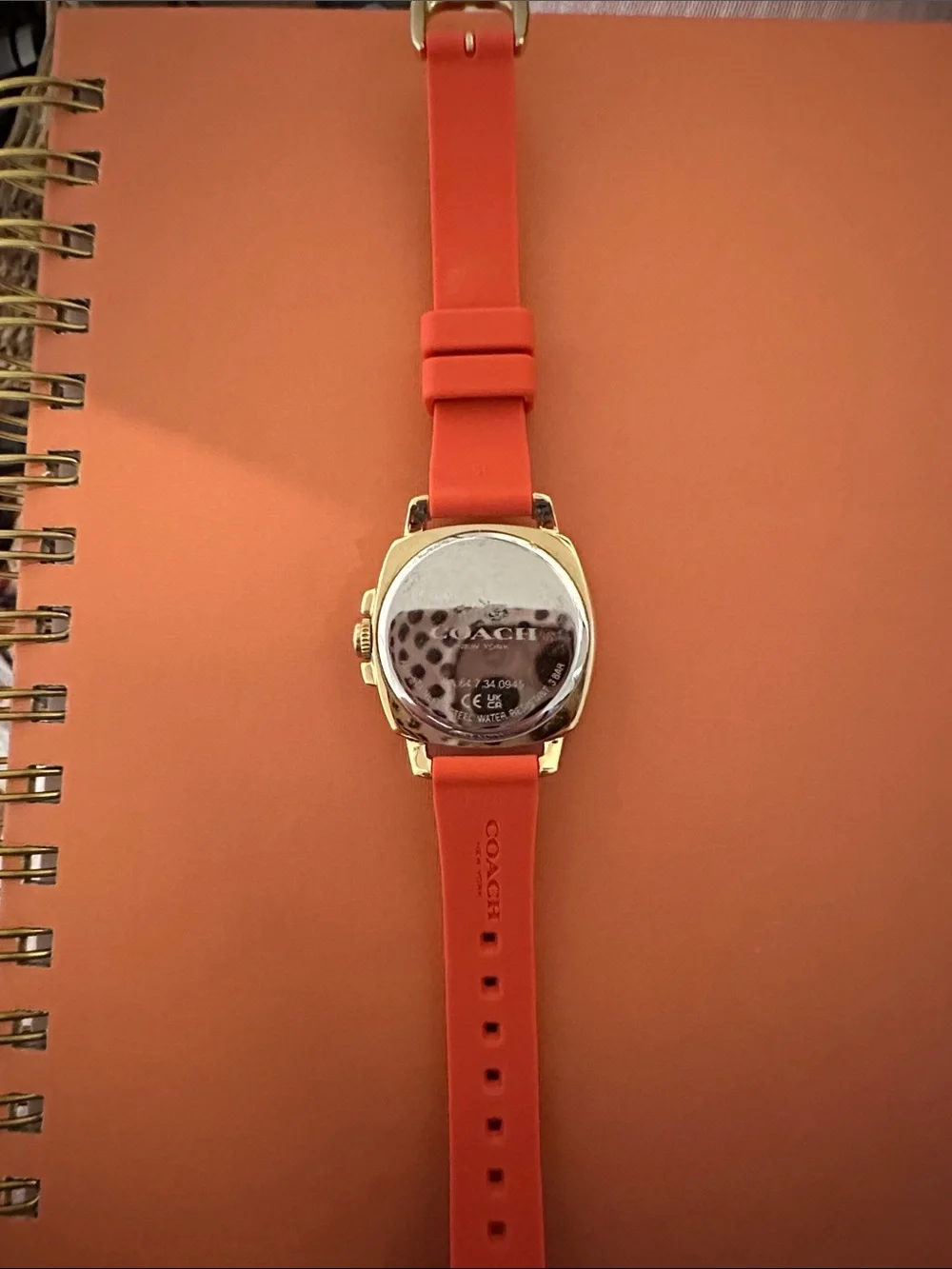 Coach Gold-Tone Case Smartwatch with Orange Silicone Strap